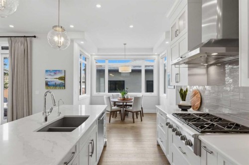 5927 34 Street Sw, Calgary, AB - Indoor Photo Showing Kitchen With Double Sink With Upgraded Kitchen