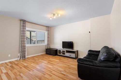 91 Panamount Common Nw, Calgary, AB - Indoor Photo Showing Living Room