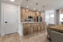 206 Greystone Boulevard, Cochrane, AB  - Indoor Photo Showing Kitchen With Upgraded Kitchen 