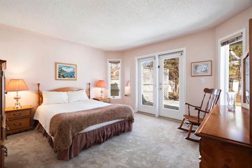 118 Shawnee Place Sw, Calgary, AB - Indoor Photo Showing Bedroom