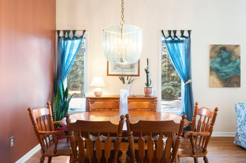 118 Shawnee Place Sw, Calgary, AB - Indoor Photo Showing Dining Room