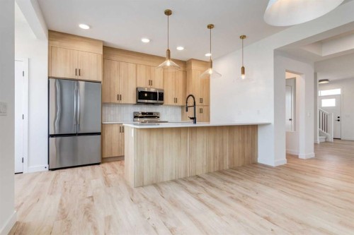 446 River Avenue, Cochrane, AB - Indoor Photo Showing Kitchen With Upgraded Kitchen