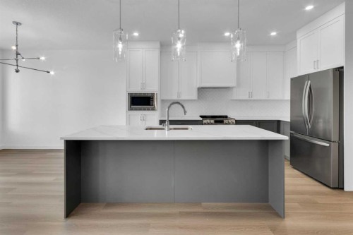 137 Copperhead Road Se, Calgary, AB - Indoor Photo Showing Kitchen With Upgraded Kitchen