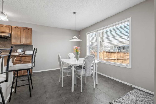 8 Chapalina Rise Se, Calgary, AB - Indoor Photo Showing Dining Room