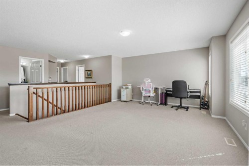 8 Chapalina Rise Se, Calgary, AB - Indoor Photo Showing Other Room