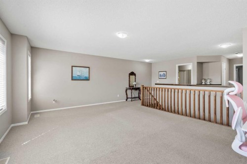 8 Chapalina Rise Se, Calgary, AB - Indoor Photo Showing Other Room