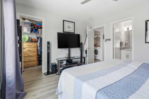 2202-250 Fireside View, Cochrane, AB - Indoor Photo Showing Bedroom