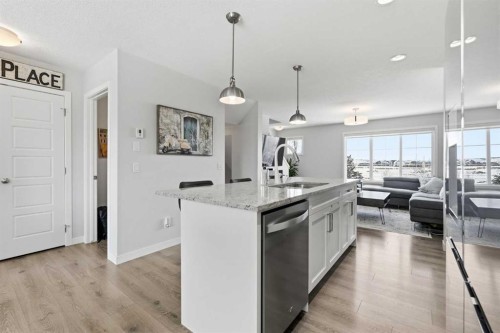 2202-250 Fireside View, Cochrane, AB - Indoor Photo Showing Kitchen With Upgraded Kitchen