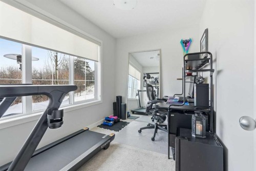 2202-250 Fireside View, Cochrane, AB - Indoor Photo Showing Gym Room