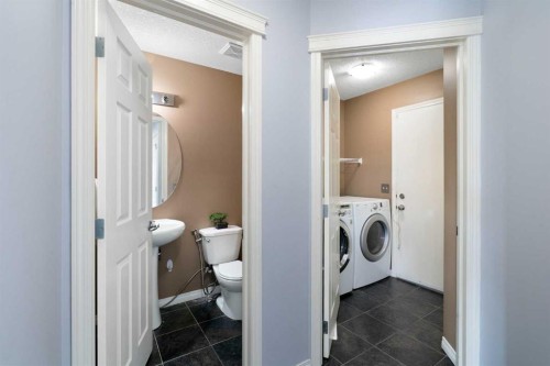 57 Bridlecrest Court Sw, Calgary, AB - Indoor Photo Showing Laundry Room