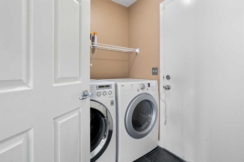 57 Bridlecrest Court Sw, Calgary, AB - Indoor Photo Showing Laundry Room
