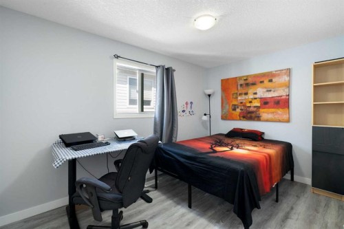 57 Bridlecrest Court Sw, Calgary, AB - Indoor Photo Showing Bedroom