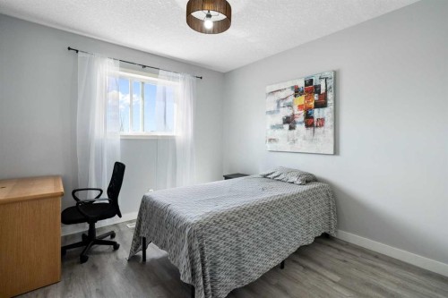 57 Bridlecrest Court Sw, Calgary, AB - Indoor Photo Showing Bedroom