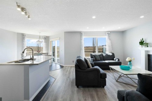 57 Bridlecrest Court Sw, Calgary, AB - Indoor With Fireplace