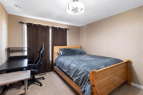 57 Bridlecrest Court Sw, Calgary, AB - Indoor Photo Showing Bedroom
