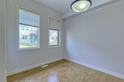 508-413 River Avenue, Cochrane, AB - Indoor Photo Showing Other Room