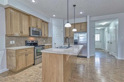 508-413 River Avenue, Cochrane, AB - Indoor Photo Showing Kitchen With Double Sink With Upgraded Kitchen