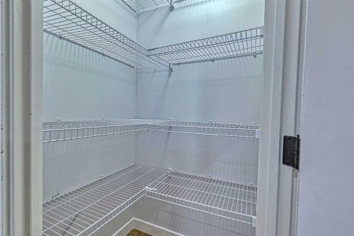 508-413 River Avenue, Cochrane, AB - Indoor With Storage