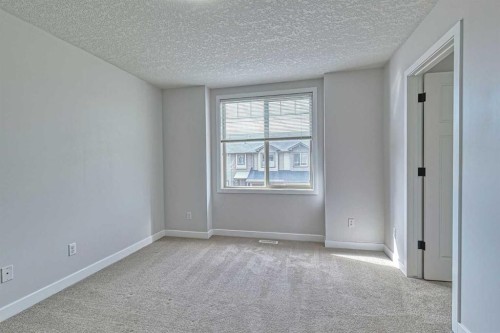 508-413 River Avenue, Cochrane, AB - Indoor Photo Showing Other Room