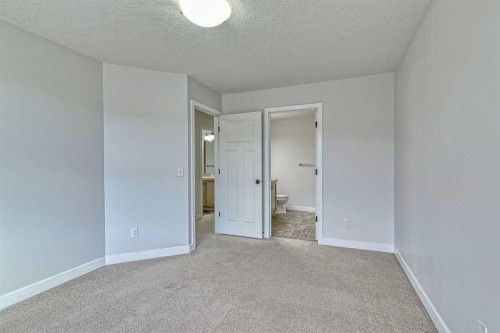 508-413 River Avenue, Cochrane, AB - Indoor Photo Showing Other Room