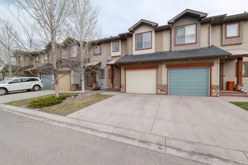 508-413 River Avenue, Cochrane, AB - Outdoor With Facade