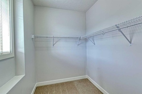 508-413 River Avenue, Cochrane, AB - Indoor With Storage