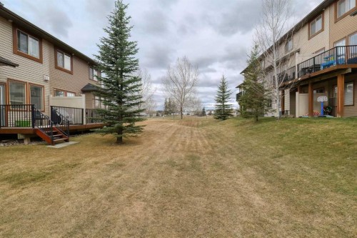 508-413 River Avenue, Cochrane, AB - Outdoor With Deck Patio Veranda