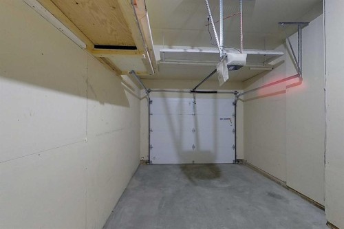 508-413 River Avenue, Cochrane, AB - Indoor Photo Showing Garage