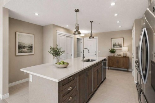 207-39 Quarry Gate Se, Calgary, AB - Indoor Photo Showing Kitchen With Double Sink With Upgraded Kitchen