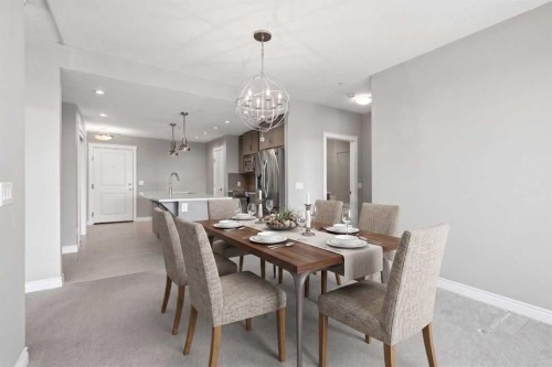 207-39 Quarry Gate Se, Calgary, AB - Indoor Photo Showing Dining Room