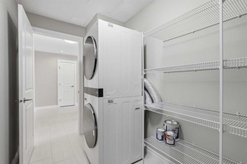 207-39 Quarry Gate Se, Calgary, AB - Indoor Photo Showing Laundry Room