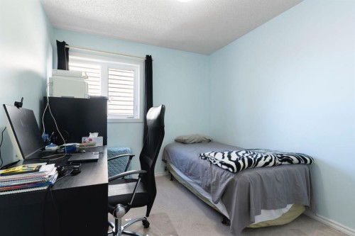 8 Hawkfield Crescent Nw, Calgary, AB - Indoor Photo Showing Bedroom