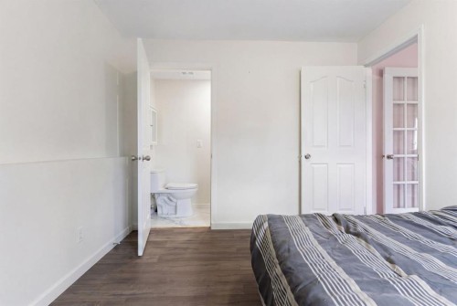 8 Hawkfield Crescent Nw, Calgary, AB - Indoor Photo Showing Bedroom