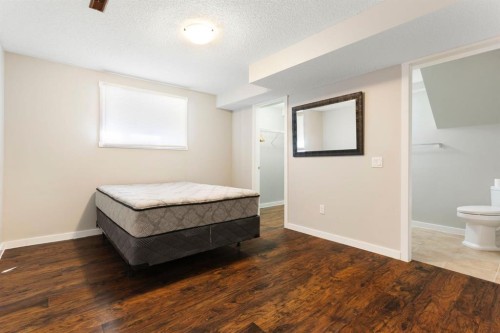8 Hawkfield Crescent Nw, Calgary, AB - Indoor Photo Showing Bedroom