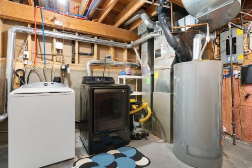 8 Hawkfield Crescent Nw, Calgary, AB - Indoor Photo Showing Laundry Room