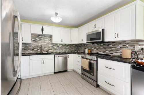 8 Hawkfield Crescent Nw, Calgary, AB - Indoor Photo Showing Kitchen With Upgraded Kitchen