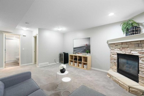 71 Chaparral Grove Se, Calgary, AB - Indoor Photo Showing Living Room With Fireplace