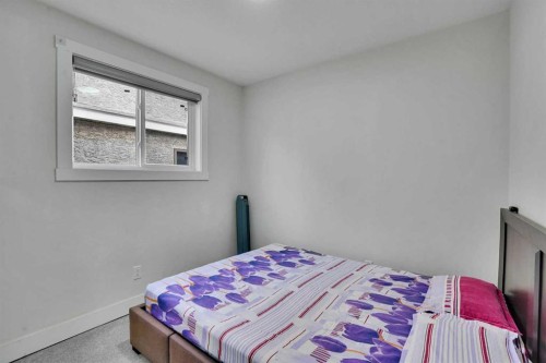 51 Taraglen Road Ne, Calgary, AB - Indoor Photo Showing Bedroom