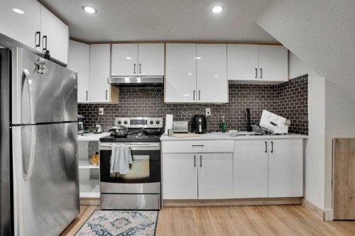 51 Taraglen Road Ne, Calgary, AB - Indoor Photo Showing Kitchen With Upgraded Kitchen