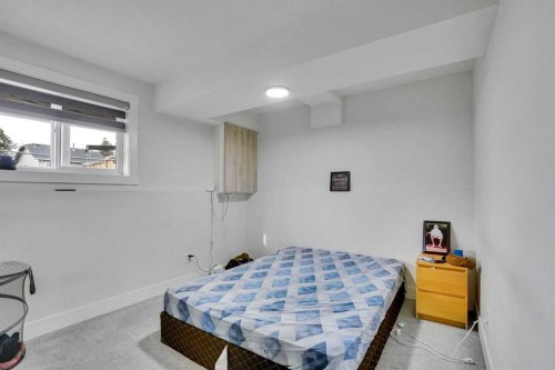 51 Taraglen Road Ne, Calgary, AB - Indoor Photo Showing Bedroom