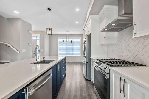 80 Wolf Gate, Okotoks, AB - Indoor Photo Showing Kitchen With Upgraded Kitchen