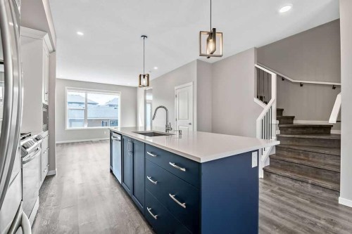 80 Wolf Gate, Okotoks, AB - Indoor Photo Showing Kitchen With Upgraded Kitchen