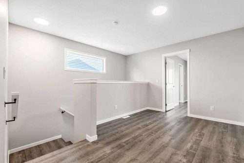 80 Wolf Gate, Okotoks, AB - Indoor Photo Showing Other Room