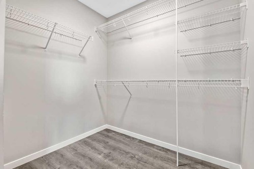 80 Wolf Gate, Okotoks, AB - Indoor With Storage