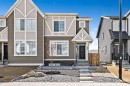 80 Wolf Gate, Okotoks, AB  - Outdoor With Facade 