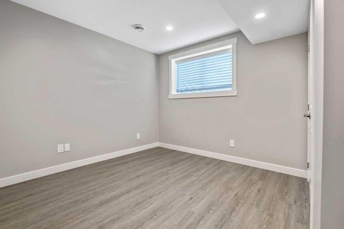 80 Wolf Gate, Okotoks, AB - Indoor Photo Showing Other Room