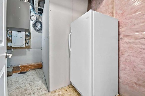 80 Wolf Gate, Okotoks, AB - Indoor Photo Showing Other Room