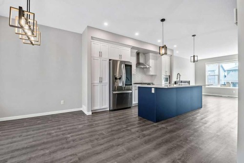 80 Wolf Gate, Okotoks, AB - Indoor Photo Showing Kitchen With Upgraded Kitchen