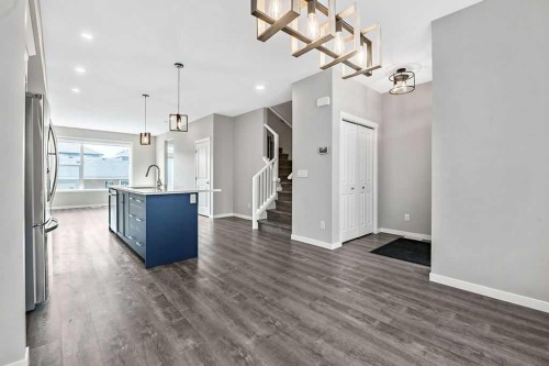 80 Wolf Gate, Okotoks, AB - Indoor Photo Showing Kitchen With Upgraded Kitchen