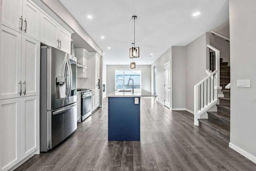 80 Wolf Gate, Okotoks, AB - Indoor Photo Showing Kitchen With Upgraded Kitchen